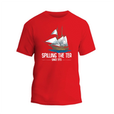 a red t - shirt with a sailing the tea logo