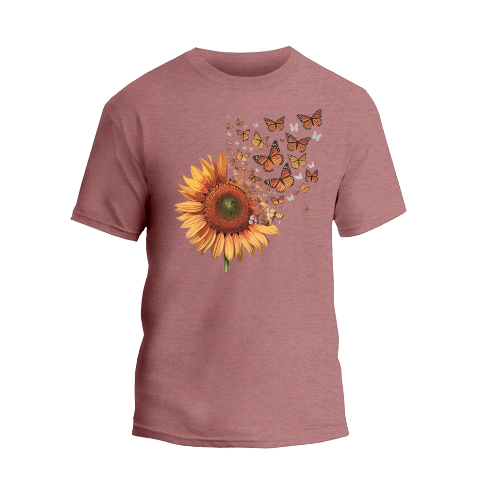 a pink t - shirt with a sunflower and butterflies on it
