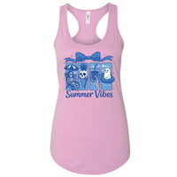 A pink tank top with a graphic design featuring a skeleton, a ghost, and a pineapple, along with the text "Summer Vibes" printed on it.