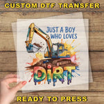 a hand holding a piece of paper that says, just a boy who loves dirt