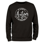 a black sweatshirt with the words autism on it