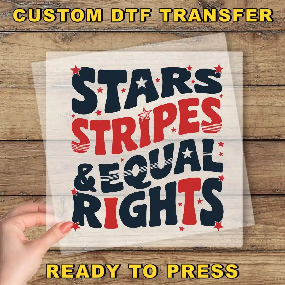 a person holding up a piece of paper with the words stars stripes and equal rights