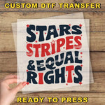 a person holding up a piece of paper with the words stars stripes and equal rights