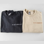 a couple of shirts that are sitting on a table