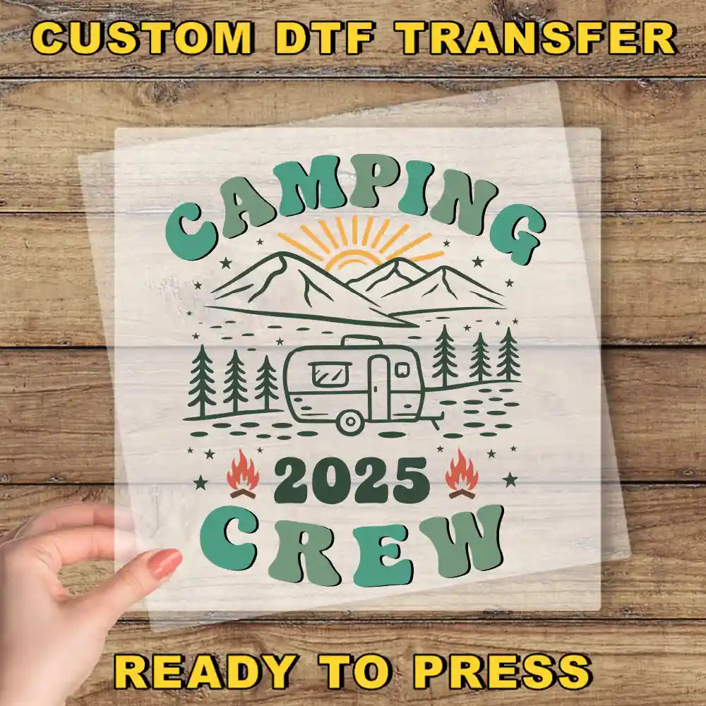 a hand holding a piece of paper with the words camping crew printed on it