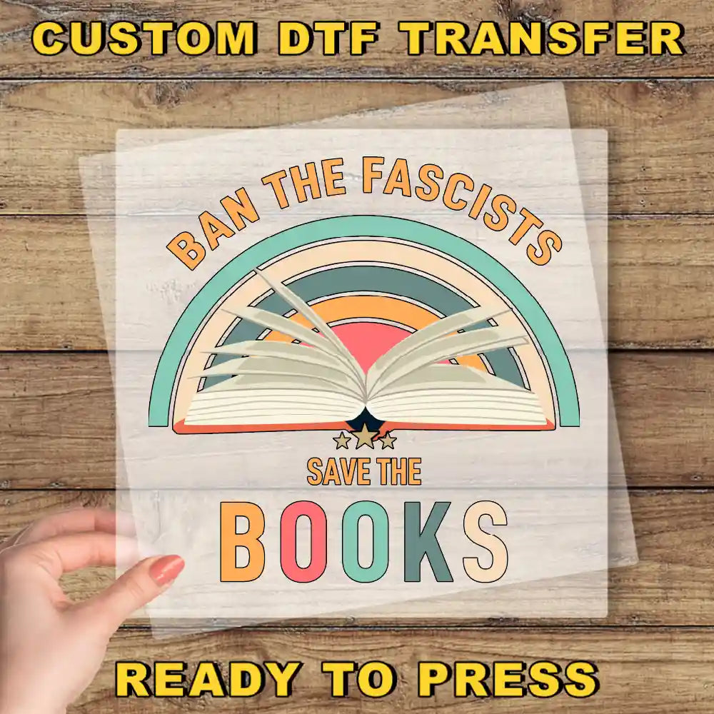 a person holding up a book with the words ban the fascitss save